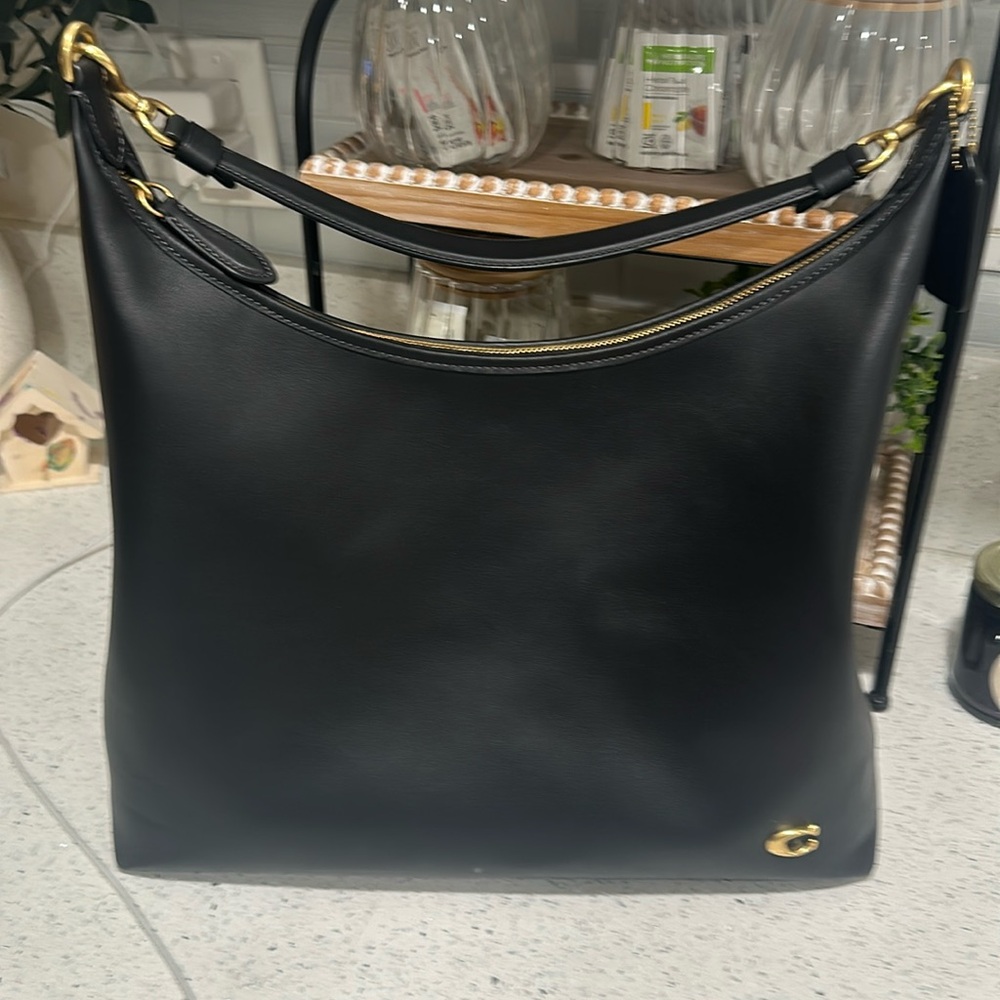 Black leather Coach Juliette shoulder handbag grey interior.